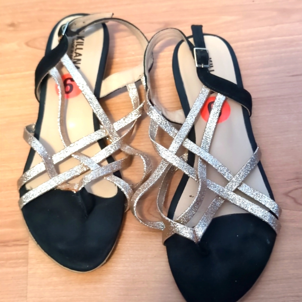 Gold and black sandals